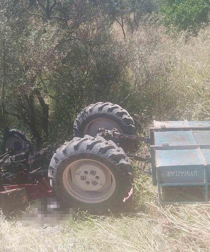 Şarampole düşen traktörünün altında hayatını kaybetti