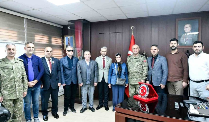 Şehit aileleri ve gazilerden Albay Altınok'a anlamlı ziyaret
